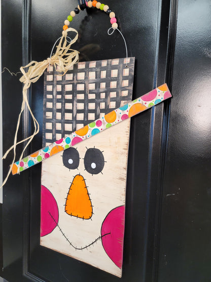Hand-Painted Scarecrow Face Door Hanger: Fall Decor with Raffia