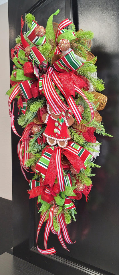 Whimsical Gingerbread Girl Christmas Swag – Red, Green & Candy Stripe Holiday Door Decor